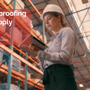 Future-Proofing the Supply Chain - woman in hard hat, standing in warehouse looking at tablet